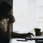 Woman watching webinar on laptop